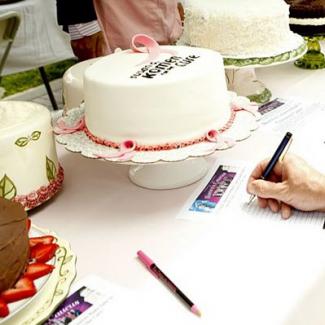 Members of the public could buy baked goods in addition bidding on cakes in a "silent auction."  The event raised close to $8,000 dollars for mammograms.