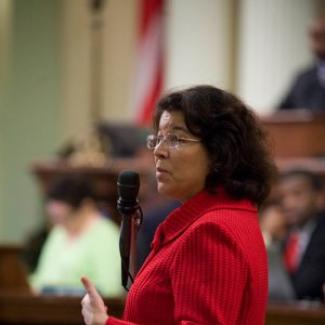 2010's chair of the Legislative Women's Caucus, then-Assemblymember Lori Saldaña, speaks to her colleagues on the Assembly floor about the importance of women's heart health on Go Red for Women day at the State Capitol.