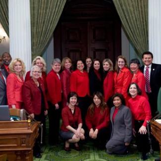 Assemblymembers wear red to highlight women's heart health in 2010.