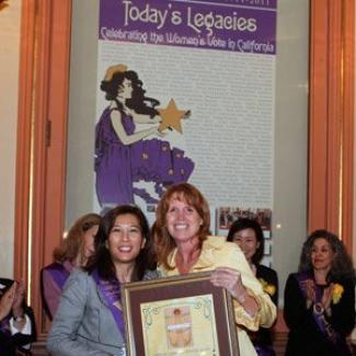 California Chief Justice Tani Cantil-Sakauye accepts her award as a “Woman of Distinction” from the Chair of the Legislative Women’s Caucus Noreen Evans.