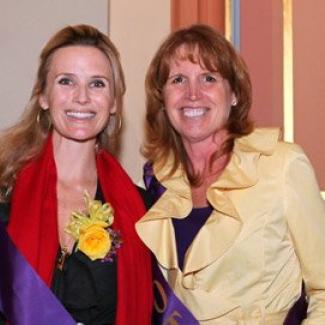 Jennifer Siebel Newsom, documentarian and wife of Lt. Governor Gavin Newsom, accepts her award as a “Woman of Distinction” from Senator Noreen Evans, Chair of the Legislative Women’s Caucus. 